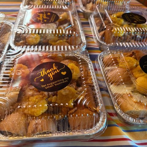 Dessert trays with homemade pastries packaged for pickup